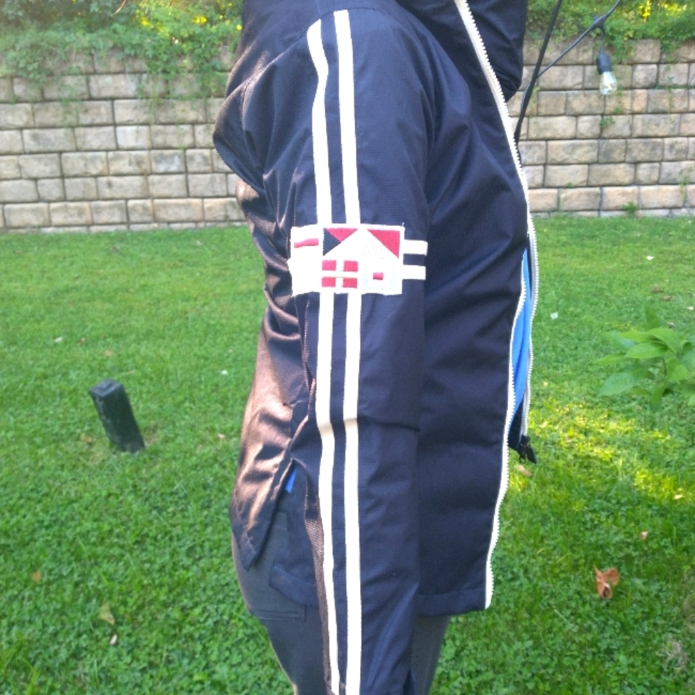 Equine Couture Navy Jacket with White Stripes and Logo. Small Hole In Lining.